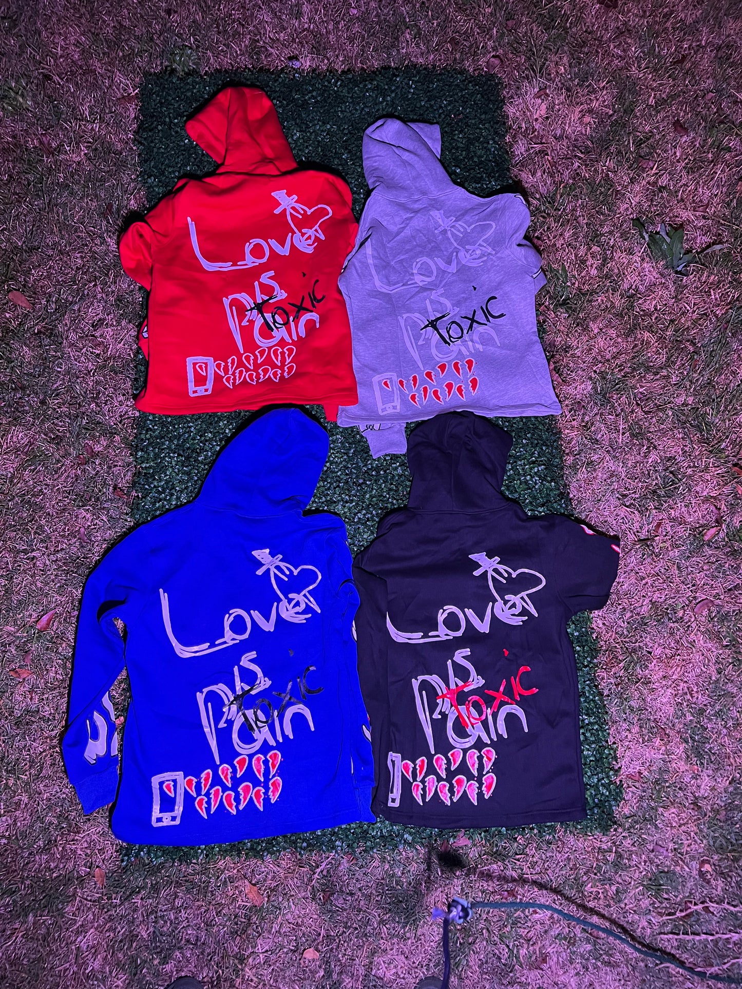 Love is pain hoodies